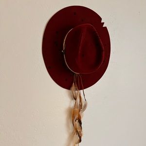 Maroon Cowboy hat.
